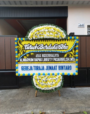 Papan Bunga Duka di Blimbingsari